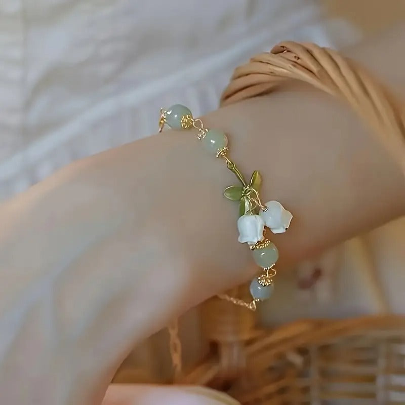 Elegant Green Beaded Bracelet with Lily of the Valley Charms